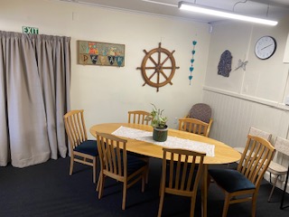 Services dining room table Lyttelton Community House